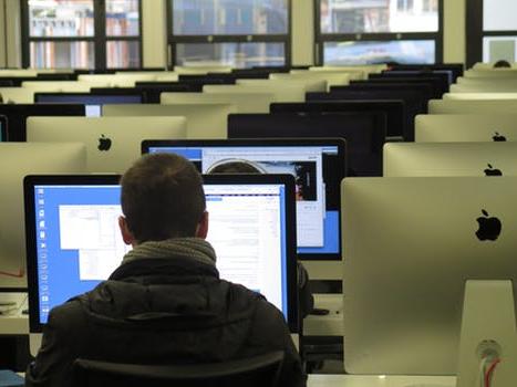 student with computer